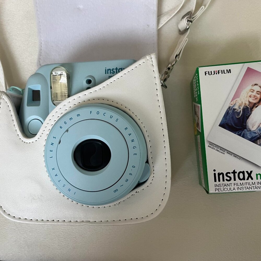 instax mini 8 polaroid camera, blue, white carrying case